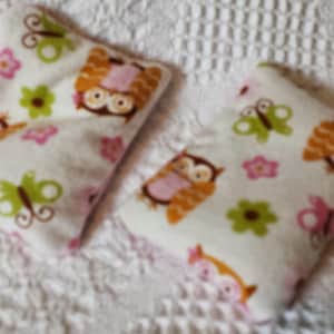 Set of two Ouchie or Boo Boo packs  all natural filling of rice and rosemary