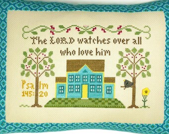 Mini cojín de punto de cruz hecho a mano: "El Señor vela por todos"