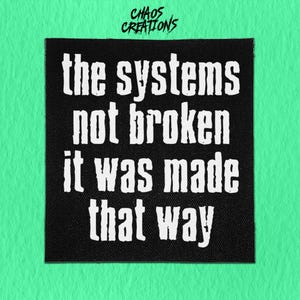 Sew On Patch | The systems not Broken | Anarchist Patch | Leftist Patch | Radical Patch