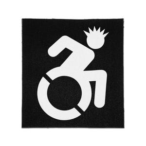 May include: A square fabric patch featuring a black background with a white graphic print of a stylized person in a wheelchair. The figure is depicted in a dynamic, forward-leaning posture with a spiky, star-like shape representing the head.