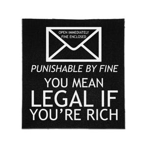 May include: A square black patch featuring a white graphic of an envelope with the text OPEN IMMEDIATELY FINE ENCLOSED. Below the envelope, the text reads PUNISHABLE BY FINE YOU MEAN LEGAL IF YOU'RE RICH in bold white capital letters.