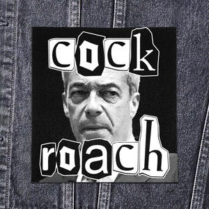 May include: A black and white patch with the words "cock roach" in a distressed font. The patch features a grayscale portrait of a man. The patch is square and appears to be made of fabric.