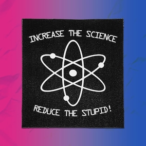 May include: A square black patch featuring a white graphic of an atom in the centre. The text "INCREASE THE SCIENCE" is printed in white above the atom, and the text "REDUCE THE STUPID!" is printed in white below the atom graphic.