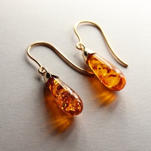 UK Made and Boxed Stunning Solid 9 carat gold and Baltic amber teardrop earrings,