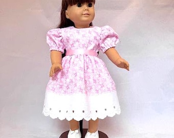Short sleeved pink party dress that fits 18in dolls