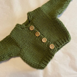 Handknit olive green cardigan sweater that fits 18in American Girl dolls