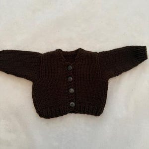 Handknit chocolate brown sweater that fits 18 inch dolls