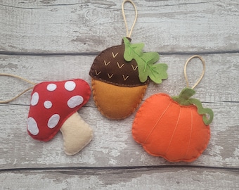 Handmade autumn decorations, pumpkin, acorn, toadstool fall ornaments