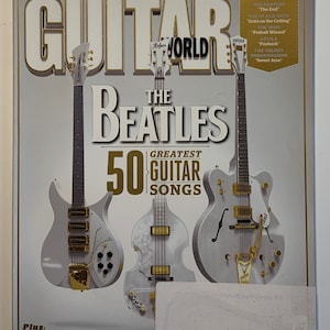 Guitar World Magazine 15 nieuwe kenmerkende gitaren The Beatles 50 beste gitaarnummers plus Jimi Hendrix en Lou Reed Vol 35 nr. 1 januari 2014