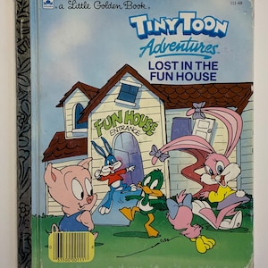 May include: A Little Golden Book cover featuring the Tiny Toon Adventures characters. The book is titled "Lost in the Fun House". The cover features a pink bunny, a blue bunny, a green duck, and a pink pig. The characters are standing in front of a house with a sign that says "Fun House".