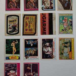 Diversos cartões colecionáveis vintage: Charlie’s Angels, Space 1999, Wacky Packages, Funky Facts, WWF, Gremlins, Three’s Company, Bay City Rollers