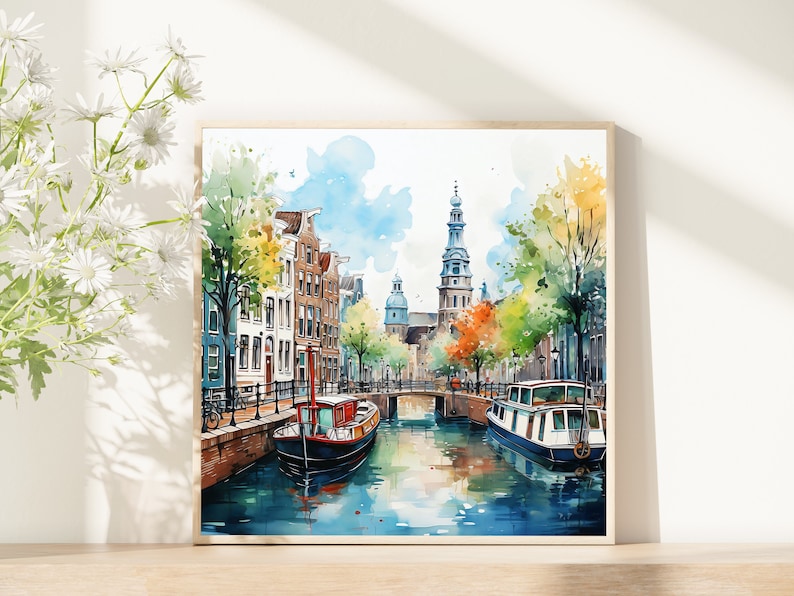 May include: Watercolor painting of a canal scene in Amsterdam, Netherlands. The painting features colorful buildings, a bridge, and two boats on the water. The sky is blue with white clouds.