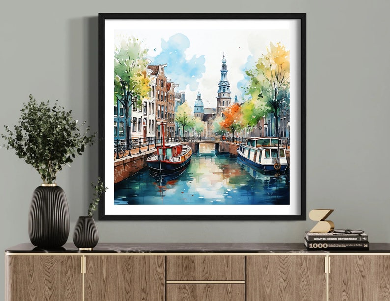 May include: Watercolor painting of a canal scene in a European city. The painting features colorful buildings, a bridge, trees, and two boats on the water.
