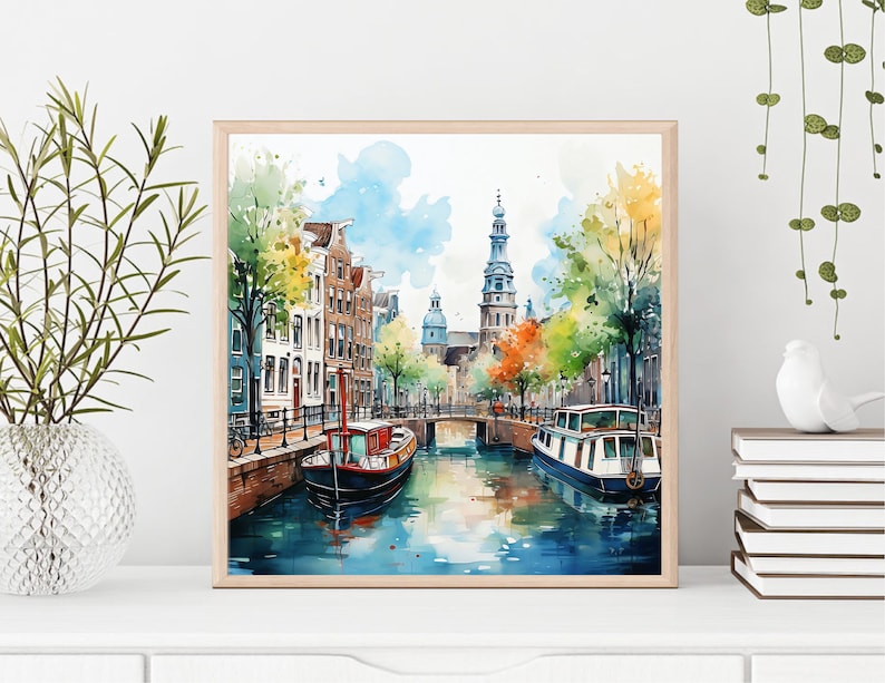 May include: Watercolor painting of a canal scene in Amsterdam, Netherlands. The painting features a narrow canal with two boats, one red and one white, and buildings lining the canal. The buildings are painted in a variety of colors, including red, yellow, and blue. The sky is a light blue with white clouds.