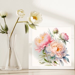 Pode incluir: Uma moldura branca com uma pintura em aquarela de pe&ocirc;nias rosa e brancas com folhas verdes. A pintura est&aacute; sobre um fundo branco.