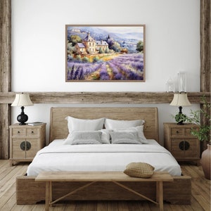 May include: A watercolor painting of a house in a field of lavender. The house is a light yellow color with a brown roof. The lavender field is a vibrant purple color. The painting is framed in a light brown frame.