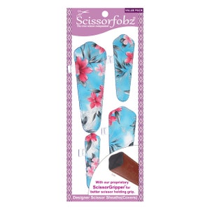 May include: A value pack of four floral patterned scissor sheaths. The sheaths are blue with pink flowers and green leaves. The text on the packaging reads "Scissorfobz The true scissor companion!" and "With our proprietary ScissorGripper for better scissor holding grip. Designer Scissor Sheaths(Covers)"