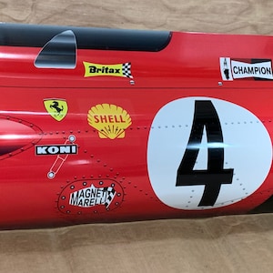 Racing 3d Jackie ickx mario andretti  lemans  formula 1 side inspired garage wall sign