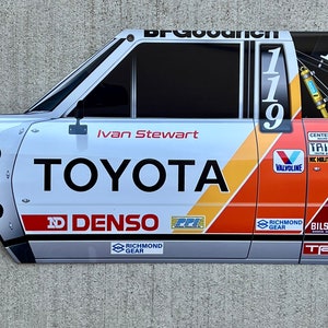 Legendary Ivan Stewart 1984 PPI Toyota pick up 4wd inspired side view wall art garage sign