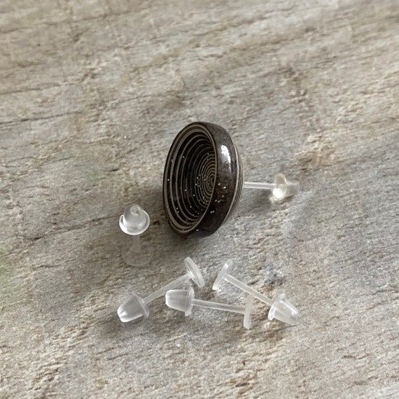 I like to remove all these annoying plastic bits off my earring backs , Earring