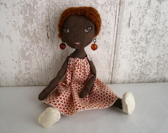 Small collectible doll, unique textile stern 18 cm, African doll orange dress