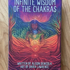 Infinite Wisdom of the Chakras oracle deck. Art by Dhira Lawrence Written by Alison DeNicola