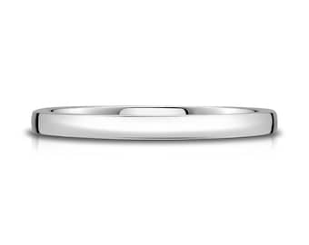 May include: A simple, polished silver wedding band.