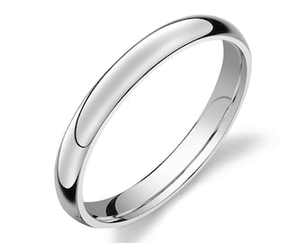Puede incluir: Una banda de boda de plata simple y pulida.