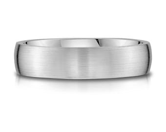 May include: A brushed silver wedding band with a rounded edge.