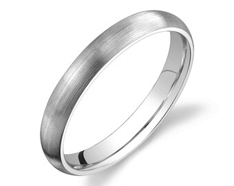 May include: A simple, brushed silver wedding band. The band has a rounded profile and a smooth, matte finish.