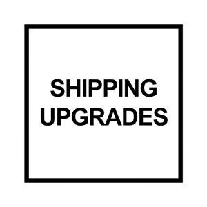May include: Black and white square with the text "SHIPPING UPGRADES" in bold, all-caps letters.
