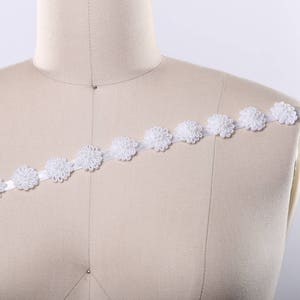 3D Ivory Flower Trim With Firm Ivory Flowers Set on a Narrow Satin Ribbon. Also Available in Ivory