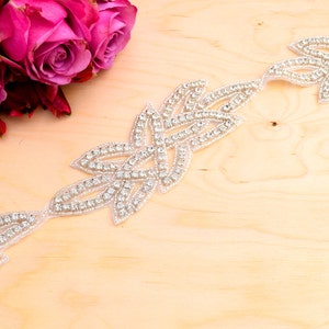 Gabriele&#39;s Silver Rhinestone Trim with Heat Transfer Aspect. Find and Spirited. Sold as Applique and as Trim