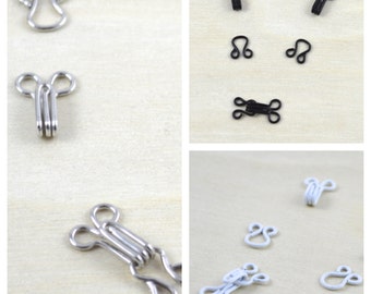 144 sets (1 Gross)  of Hook and Eye Claps for Dresses, Shirts and Bras. Avalible in Black, White and Silver in Four Sizes