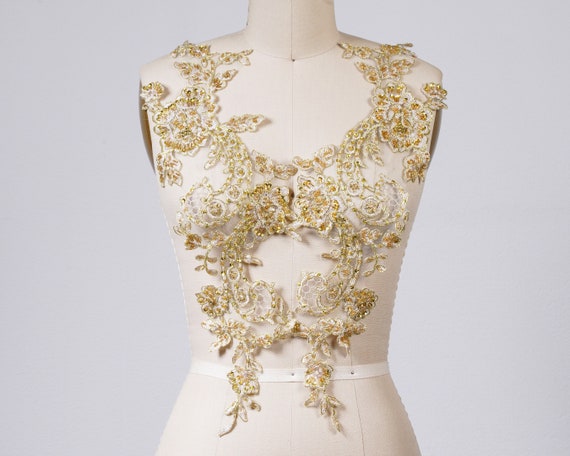golden globes pink dress 2024 Plunge Red Jersey Gold Lace Cutout Back Dramatic Mermaid Prom Dress