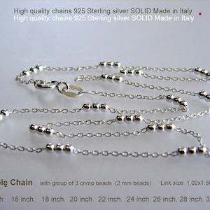 May include: Silver cable chain necklace with a group of three crimp beads. The chain is available in lengths from 16 to 30 inches.