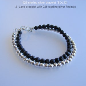 May include: A black lava rock and sterling silver bead bracelet. The bracelet is made with 925 sterling silver findings.