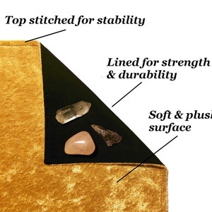 May include: A gold velvet crystal grid with a black velvet lining. The grid has a top stitched edge for stability and a soft, plush surface. The text "Lined for strength & durability" is visible.