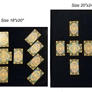 May include: Two black velvet boards with gold trim, each displaying a different size tarot card spread. The smaller board is 18 inches by 20 inches and shows a 5-card spread. The larger board is 20 inches by 24 inches and shows a 9-card spread. Both boards feature intricate gold and blue tarot cards.