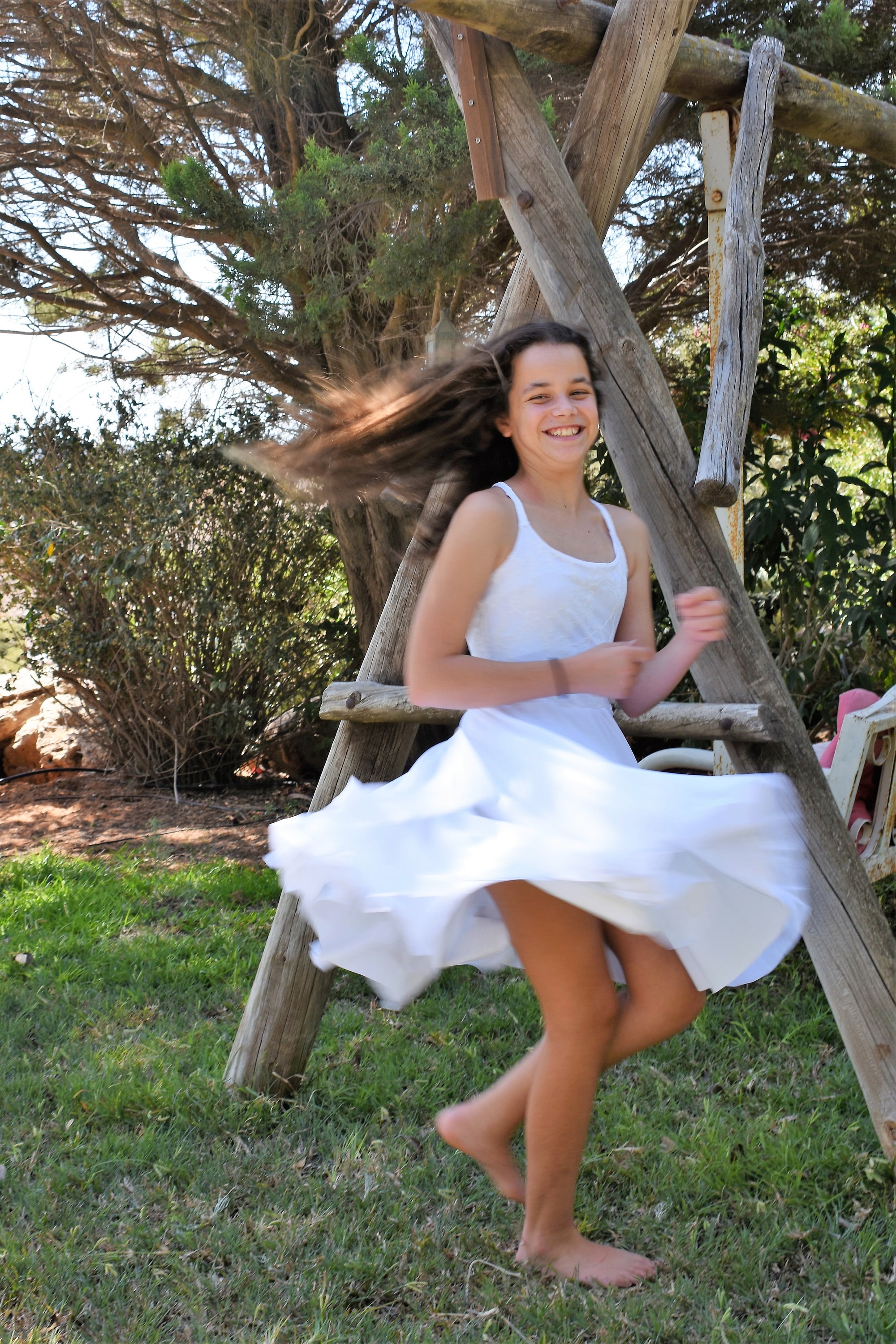 Teen Girl Picks Flowers In A Summer Dress Stock Photo Download Image ...