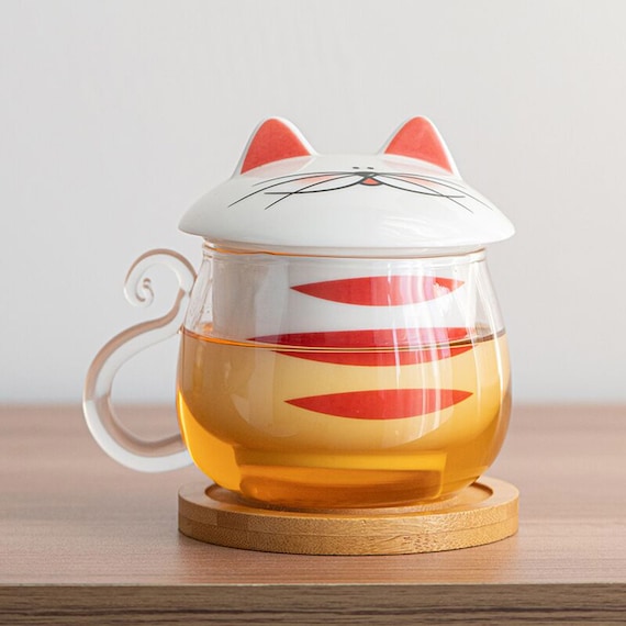 Tasse à thé en verre avec infuseur et couvercle en porcelaine