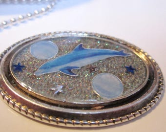 Necklace blue dolphin in a sea of sequins