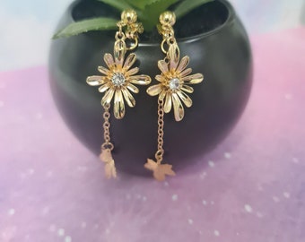 boucles d'oreilles petite fleur dorée