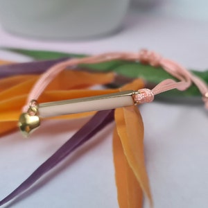 Adjustable pearl pink bracelet