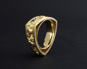 750/- ring with 9 sapphires and 12 diamonds