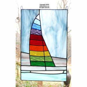 Sailboat Stained Glass Panel with multi colored sail.