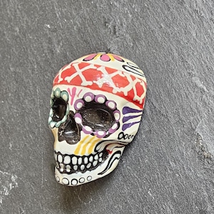 Hand made Sugar skull fridge magnet. Mexican day of the Dead. Skull magnet. Hand-painted skull. Miniature sugar skull with headband.
