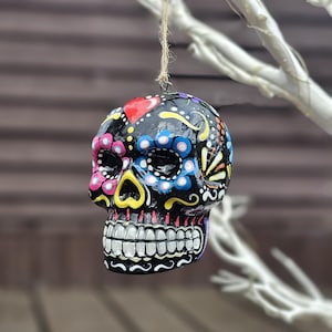 Mexican day of the Dead ceramic hanging sugar skull. Sugar skull bauble. Hand painted skull. Hanging skull decoration. Halloween decoration.