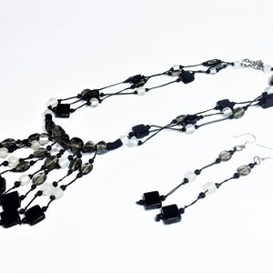 Multi-strand necklace with matching earrings. Hand-knotted necklace. Vintage Black and white jewelry set