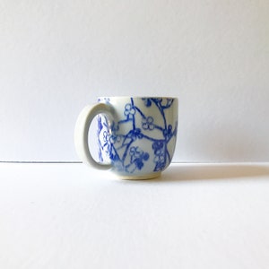 Handmade Coffee Mug. 8 oz blue flower Hand Thrown Stoneware. Pottery Mug. Coffee lovers gift